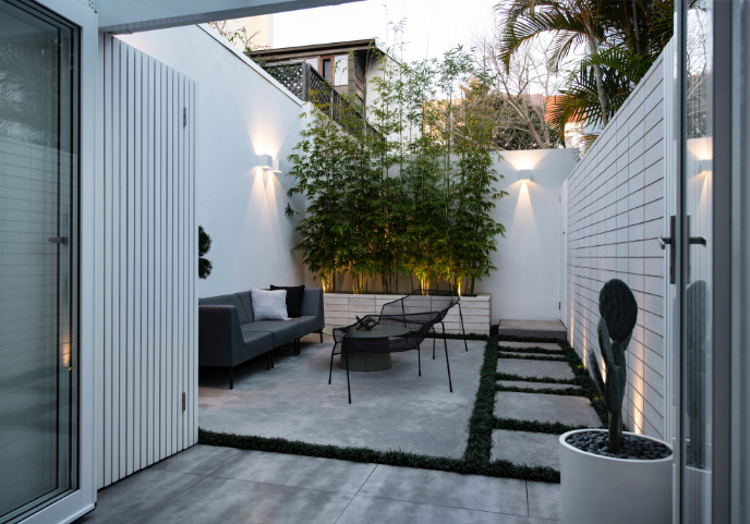 Landscape designer Sydney project featuring drought-tolerant plants and refined hardscape details.